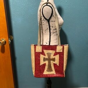 Vinyl Tote Bag w/scrolled design, canvas straps, black stitching. Double T’s